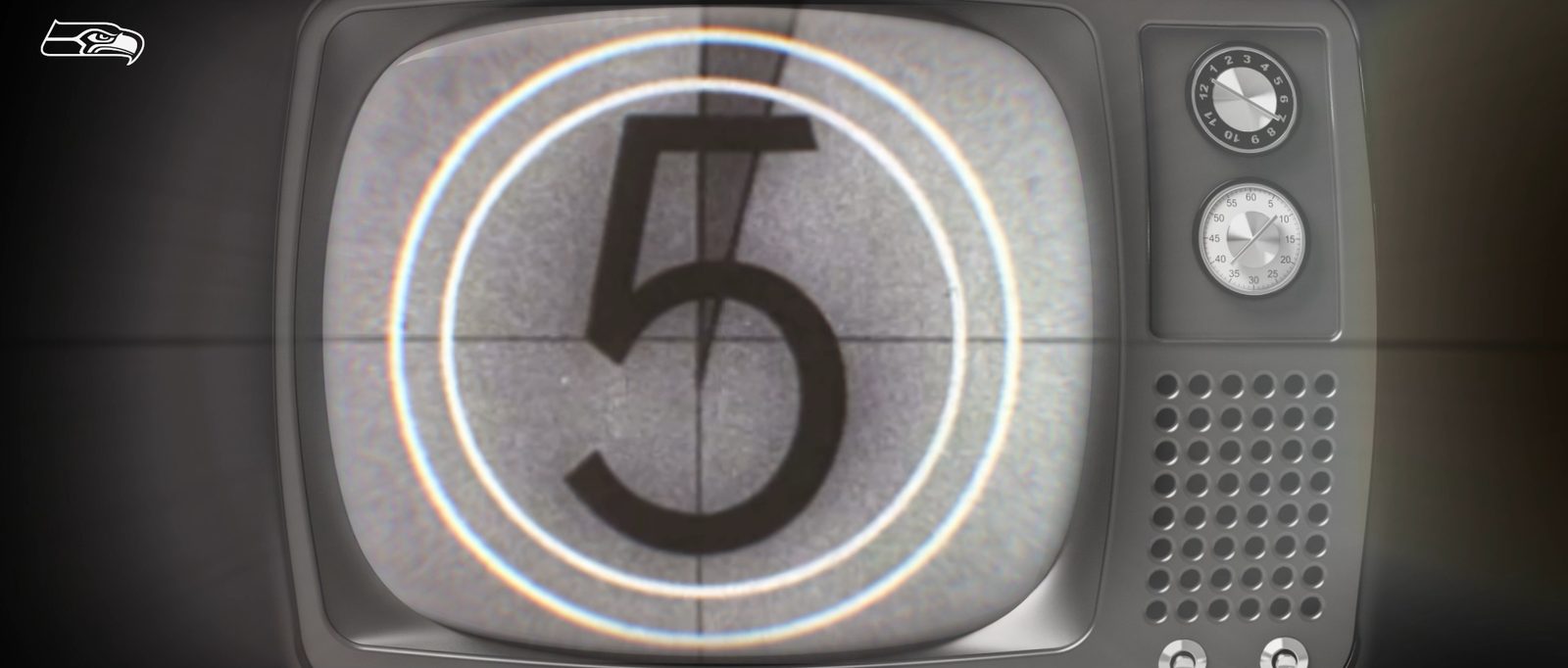 Still from Before the Noise, Episode 1. A film-leader countdown, stopped on 5, plays on a vintage television set.